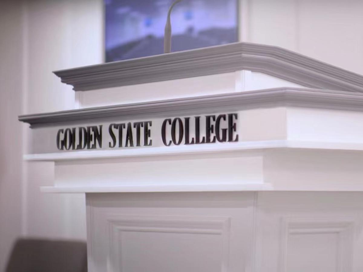 Golden State College 官网带校名的室内讲台照片；仅作机构识别，不代表具体项目授课地点或出境要求。
